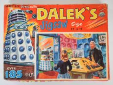 Doctor Who and the Daleks jigsaw puzzle featuring William Hartnell and his companion inside the
