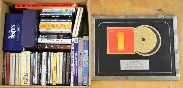 Beatles collection of approximately thirty five CDs and four DVDs. Includes several box sets and a