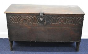 18thC carved elm coffer with iron lock plate and clasp raised on V plank legs, W98 x D38 x H59cm