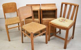 Pair of Heals limed oak pot cupboards and three chairs, one with inset Heals plaque, tallest 69cm