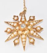 Edwardian 15ct gold pendant/ brooch set with an old cut diamond of approximately 0.2ct and split