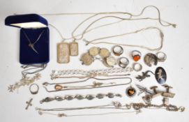 A collection of silver including matching necklace and bracelet, two signet rings, ring mount,