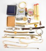 A collection of jewellery including Stratton notepad, watches, carved jet brooch, cheroot holder