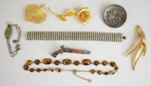 A collection of jewellery including Monet necklace, brooches including Corocraft, Trifari, Miracle