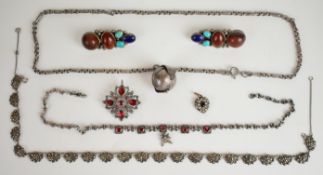A collection of silver jewellery including necklace set with foiled garnets, marcasite necklace,