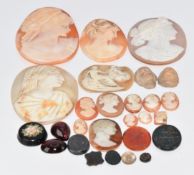 Sixteen loose shell cameos, mother of pearl cameo, two loose lava cameos, micro mosaic plaque,