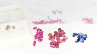 A collection of loose sapphires (total 7.2ct) sixteen marquise cut loose rubies (6.2ct), ruby