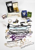 A collection of jewellery including white metal filigree pendant, five bracelets (all test as 880-