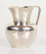 Victorian hallmarked silver miniature cream jug of bulbous form, Birmingham 1896, maker's mark