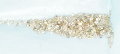 A collection of loose diamonds including rose, old, baguette and round cut, 22.8ct