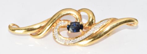 An 18ct gold brooch set with a sapphire and diamonds, 3.3g, 4cm