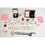 A collection of silver jewellery including earrings set with diamonds, two 'medic alert bracelet',