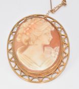 A 9ct gold brooch set with a cameo depicting a young woman, 10.8g, 4.2 x 3.5cm