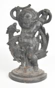 19th century cast iron figural putti and dragon doorstop or Porter, H 37cm