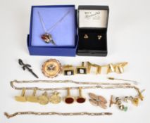A collection of jewellery including silver earrings, two silver pendants, silver necklace and