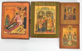 Four Russian / Christian Orthodox icons, largest 28 x 21cm