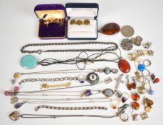 A collection of silver jewellery including two pairs of pressed amber earrings, necklace, two