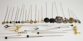 A collection of hat pins including two micro mosaic, French jet, etc
