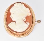 A 9ct gold brooch set with a cameo depicting a young woman, 6.8g, 2.8 x 3.4cm