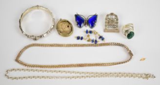 A collection of silver jewellery including bamboo bangle, brooch, malachite ring, necklace,