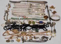 A collection of jewellery including French jet necklace, silver rings, silver handled knives, silver