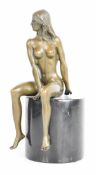 Erotic bronze figure of a seated nude woman, on cylindrical marble base, signed Claude to rear of
