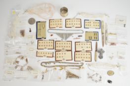 A collection of jewellery including Georgian silver brooch set with paste, two diamanté necklaces,