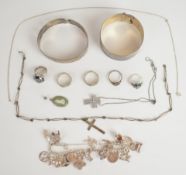 A collection of silver jewellery including Charles Horner bangle with embossed decoration, bangle