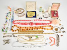 A collection of jewellery including pressed amber necklace, Murano glass necklace, cultured pearl