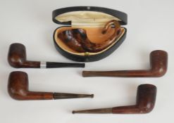 Five smoking pipes including a cased example by Hawkesley and Sons in either tortoiseshell or faux