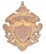 A 9ct gold fob 'Andrew Buchans Brewers Ltd' 'February 1931 for twenty years faithful service' , 14.