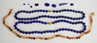 Two beaded lapis lazuli necklaces, lapis lazuli plaques, and a quartz necklace with 9ct gold clasps