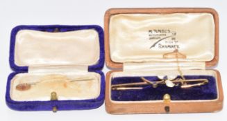 A 9ct gold brooch set with sapphires and blister pearls (4g, 6cm), and a Victorian stick pin, both