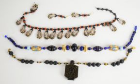 Three Eleyne Williams beaded necklaces, the first necklace 'Silk Route' made up of Venetian glass