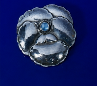 Georg Jensen silver pansy brooch set with a moonstone cabochon, design number 113, 12.2g, 4 x 4.2cm