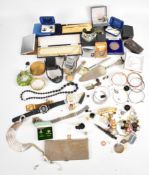 A collection of jewellery including silver St Christopher, two silver Victorian buttons, silver
