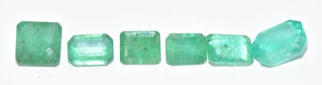 Six loose emerald cut emeralds comprising 0.9ct, 0.9ct, 0.6, 0.7, 0.5, 0.3ct