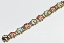 Micro mosaic bracelet made up of circular panels depicting birds and flowers, the clasp with Chi Rho