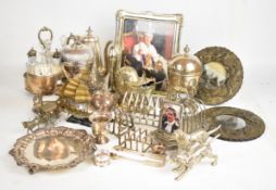 Silver plated items to include cruet set, pair of Chinese or similar dragon photograph frames, toast