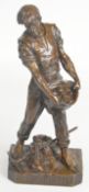 Emile Louie Picault bronze of a miner with lamp and tools 'Le Minerai', H26cm