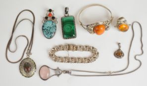 A collection of silver jewellery including bangle set with amber, malachite pendant, amber and