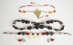 Three Eleyne Williams beaded necklaces, the first necklace 'The Music of Time' made up perfume