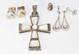 A pair of 18ct white gold earrings (2.8g), a pair of 9ct white gold earrings set with diamonds (