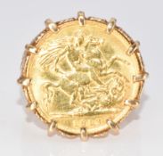A 9ct gold ring set with a 1913 gold half sovereign, 8.9g, size P