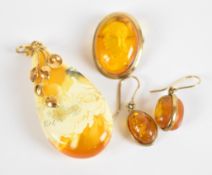 A 9ct gold pendant / brooch set with a cameo, pressed amber earrings (damaged) and a 14ct gold