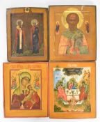 Four Russian / Christian Orthodox icons, largest 33 x 26cm