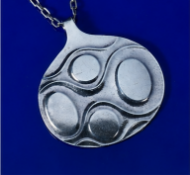 Georg Jensen silver modernist pendant with London import mark for 1974, design number 119 by Ibe