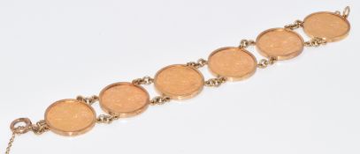 A 9ct gold bracelet set with six gold full sovereigns comprising 1910, 1911, 1903 with Sydney mint