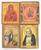 Four Russian / Christian Orthodox icons, largest 22.5 x 18cm