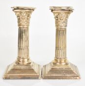 Elkington & Co Ltd pair of Edward VII hallmarked silver Corinthian column candlesticks, Sheffield